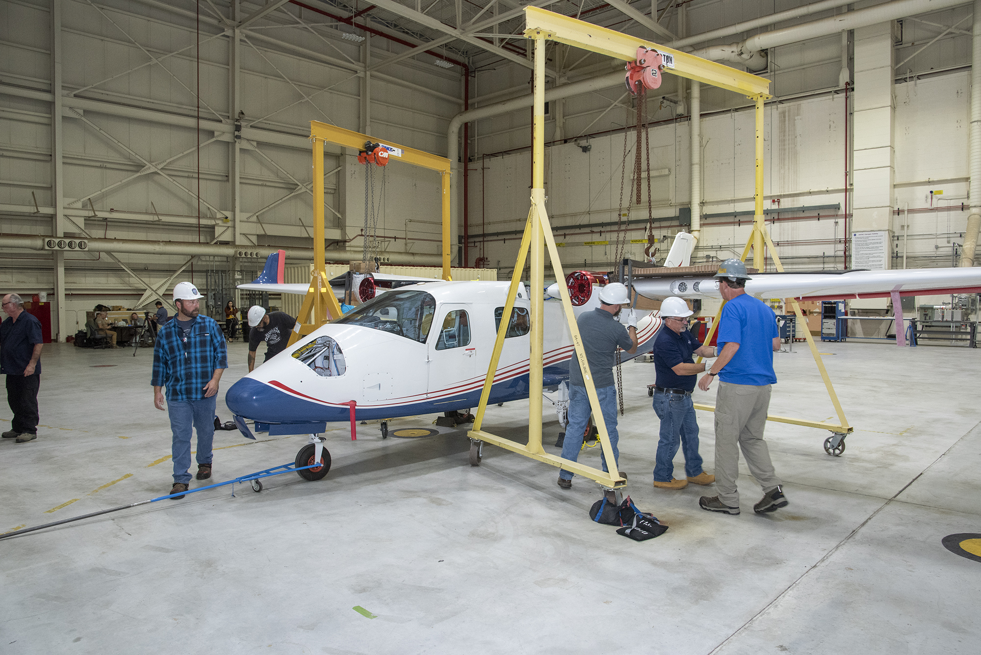 The X-57 Mod II wing is rejoined with the aircraft?s fuselage.