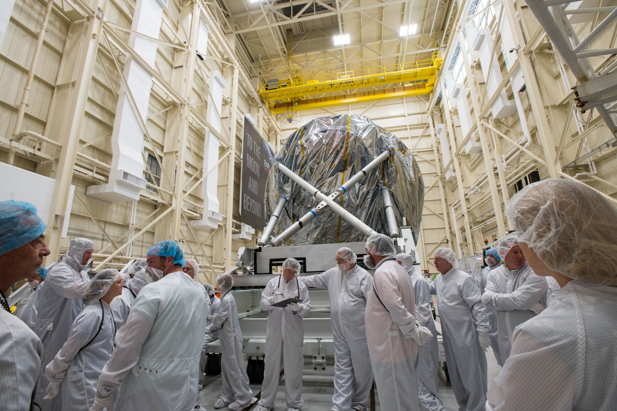 Engineers working to keep the test chamber clean.