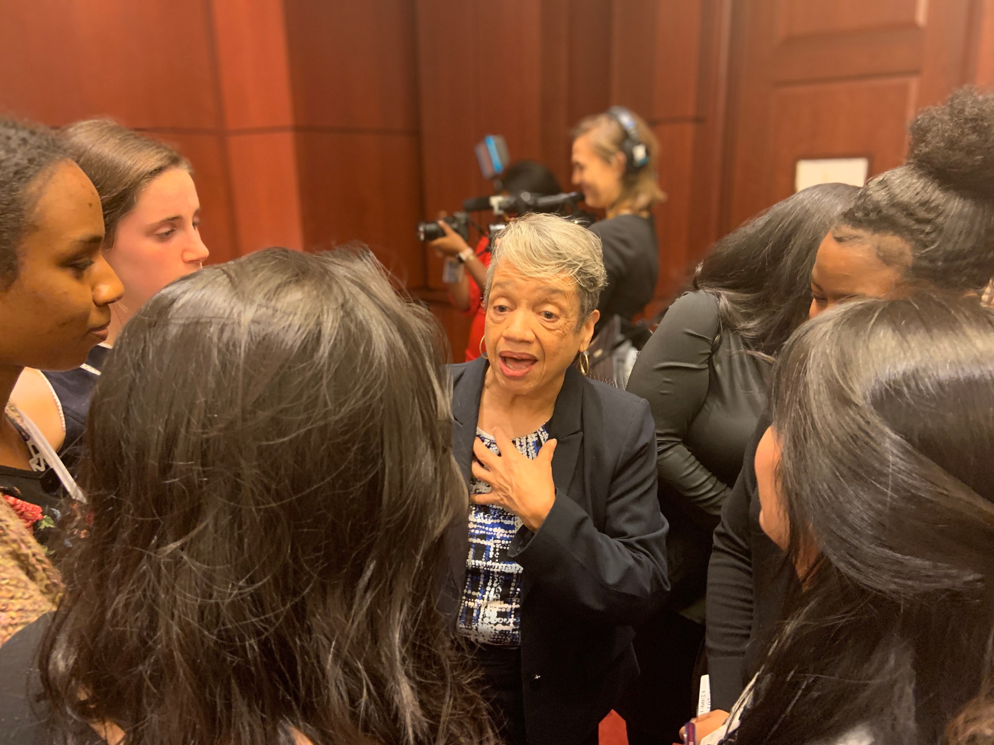 etired NASA aerospace engineer Dr. Christine Darden discusses STEM education with a group of female high schools student during a ceremony to honor the Hidden Figures Congressional Gold Medal Act.