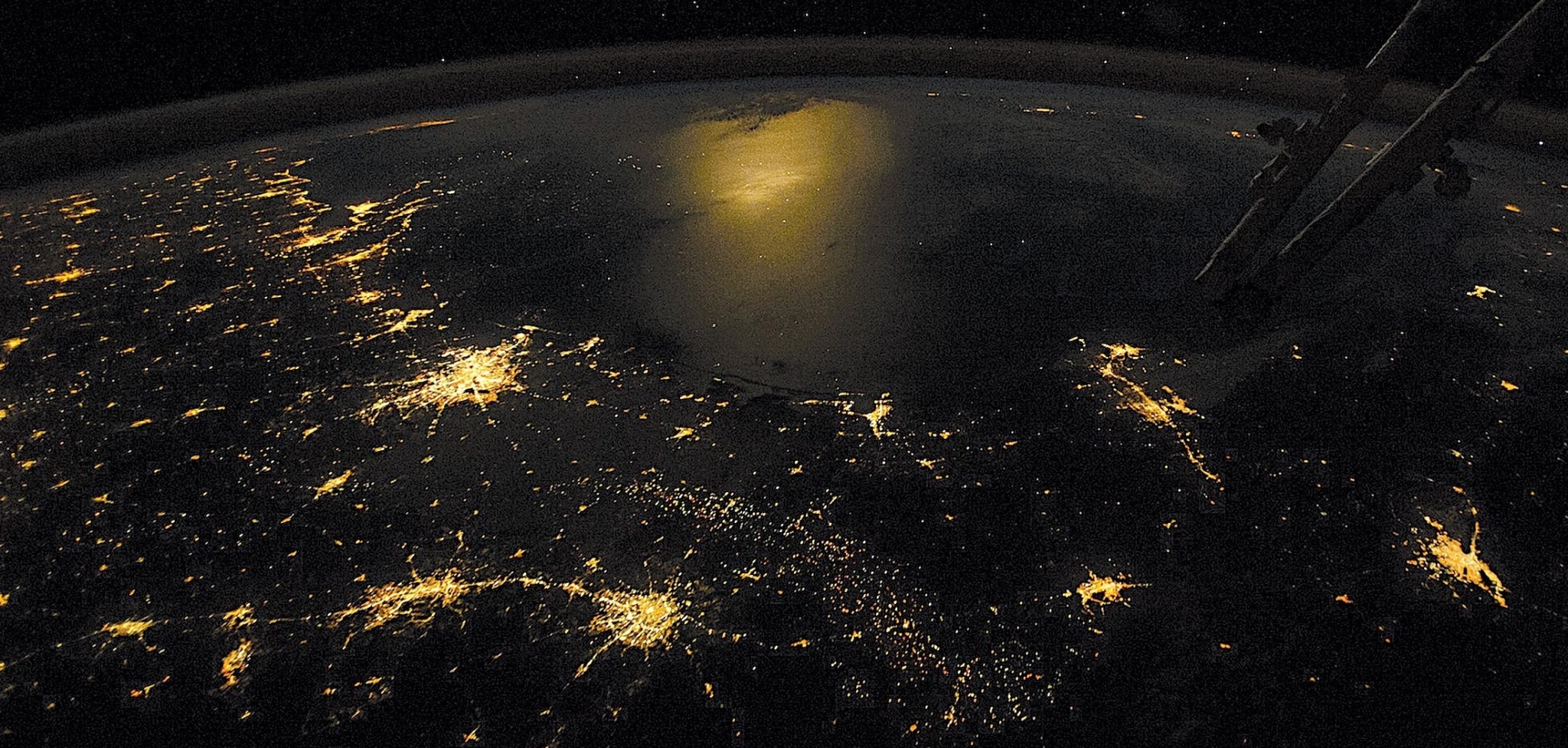 “Earth at Night” shows how scientists use images such as this astronaut photo of the Gulf of Mexico taken from the ISS