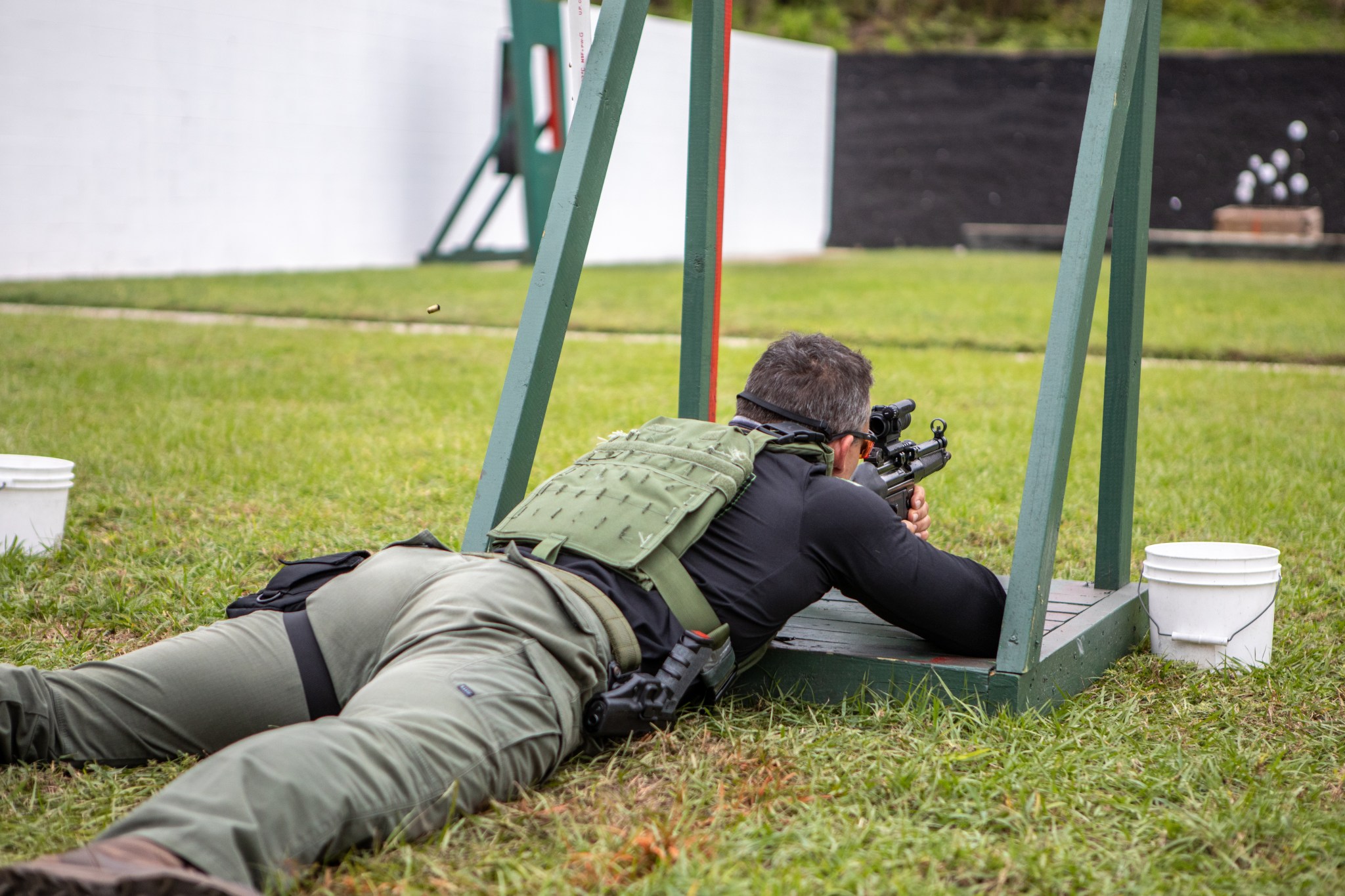 An Emergency Response Team member takes at a target during the sharpshooter tactical challenge at the annual SWAT Round-Up.