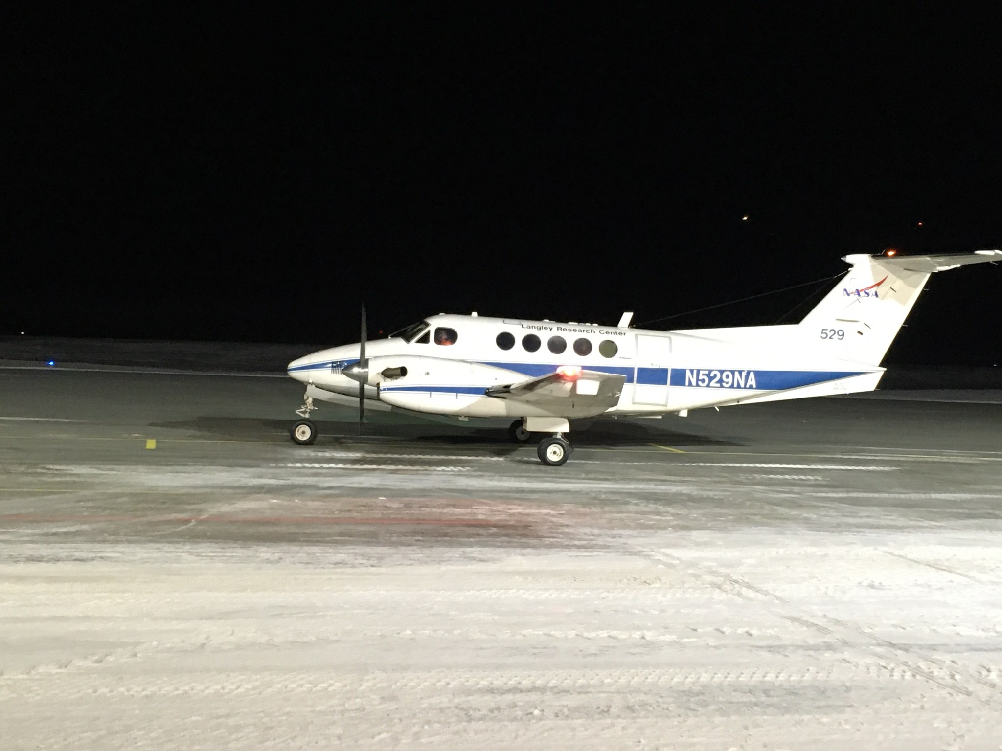 Langley's King Air B200 taxies out for a mission