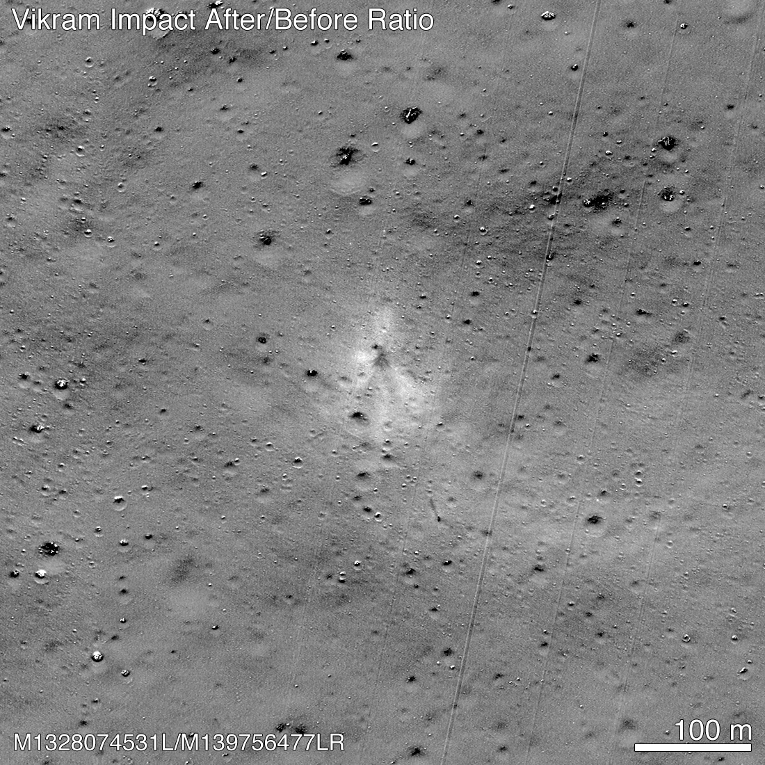 pale image of moon with impact site