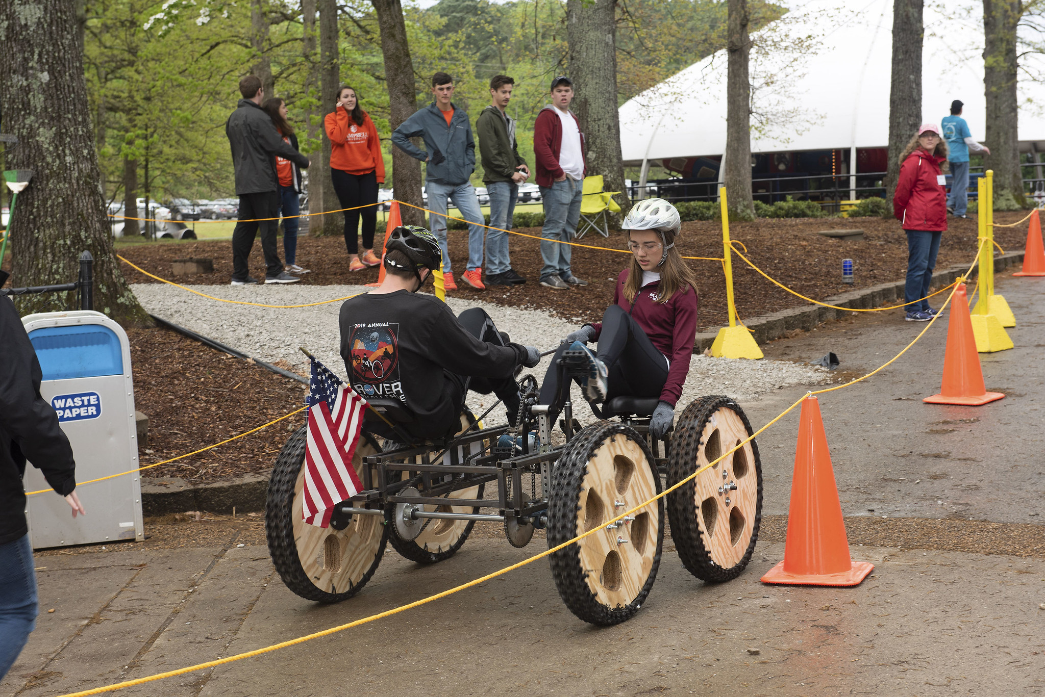 2 people on a human-powered rover