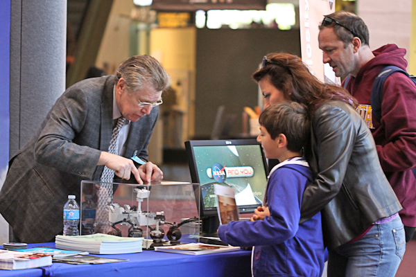 Michael Aguilar shows Smithsonian visitors a model of NASA’s Curiosity Rover