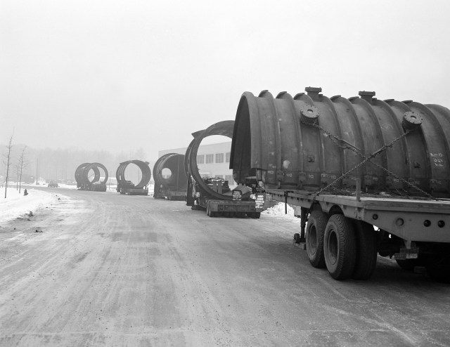 Steel casings arriving on trucks.