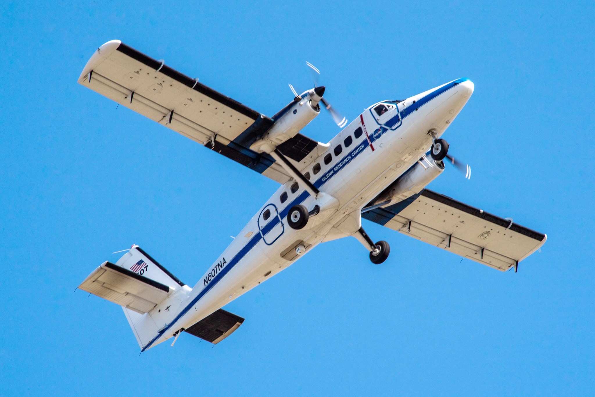 Twin Otter Aircraft in the sky from below.