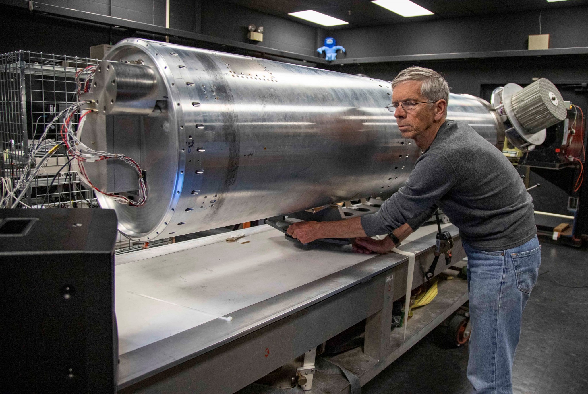 Image of Scott Bailey and PolarNOx payload in the lab