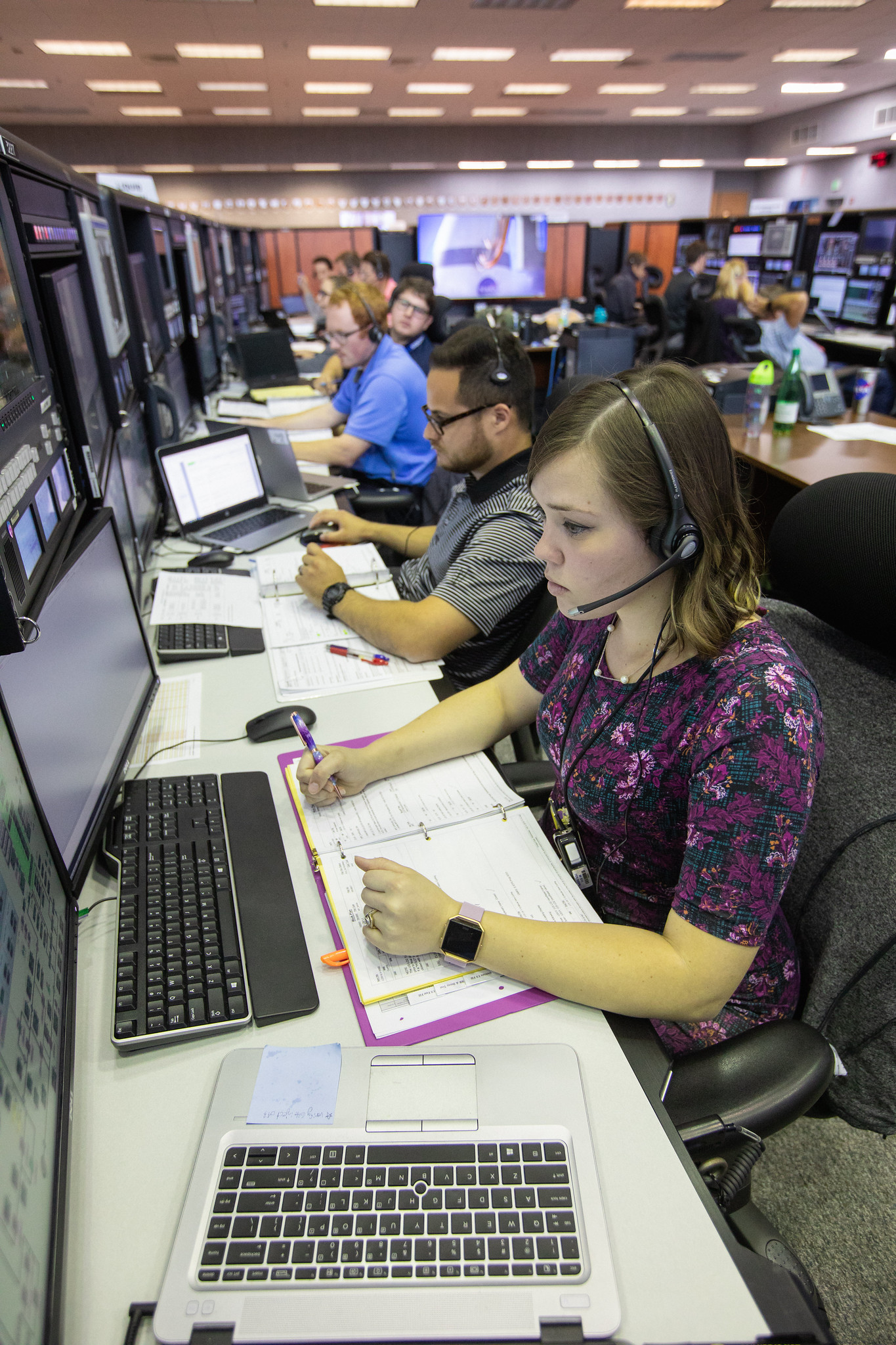 Artemis I launch team members monitor activities during the first formal terminal countdown simulation inside Firing Room 1.