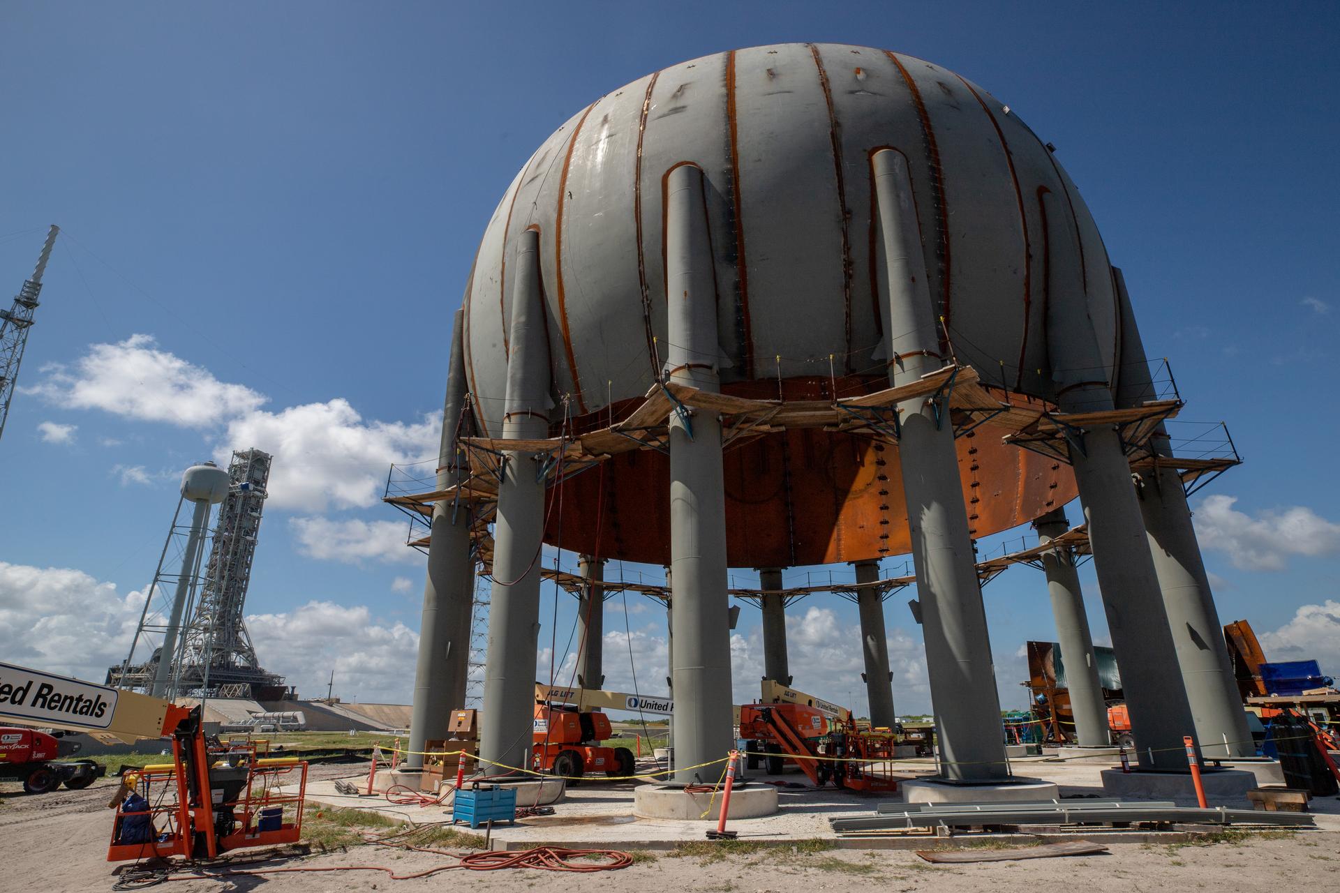 Build-up of a new liquid hydrogen (LH2) storage tank is in progress at Launch Complex 39B at Kennedy Space Center in Florida.