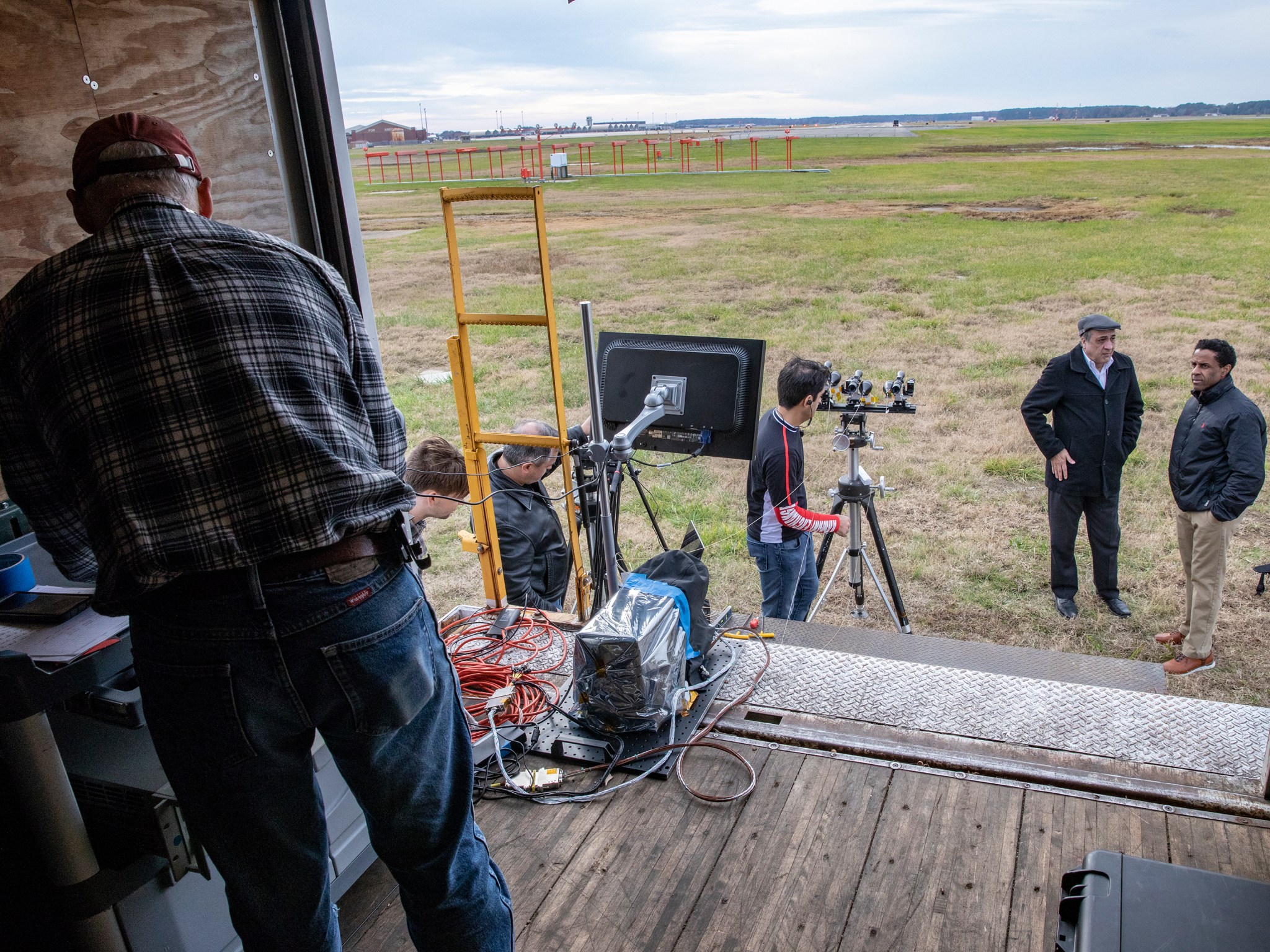 Team of engineers prepare for instrument testing