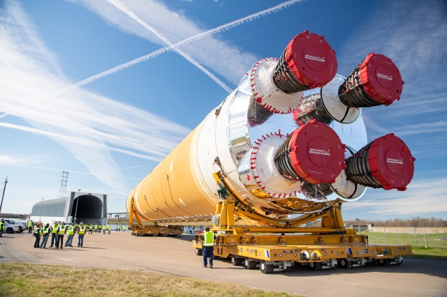 The first Artemis rocket stage is guided toward NASA’s Pegasus barge Jan. 8