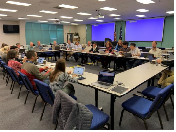EPIC attendees participate in one of four round table discussions on 5 December 2019