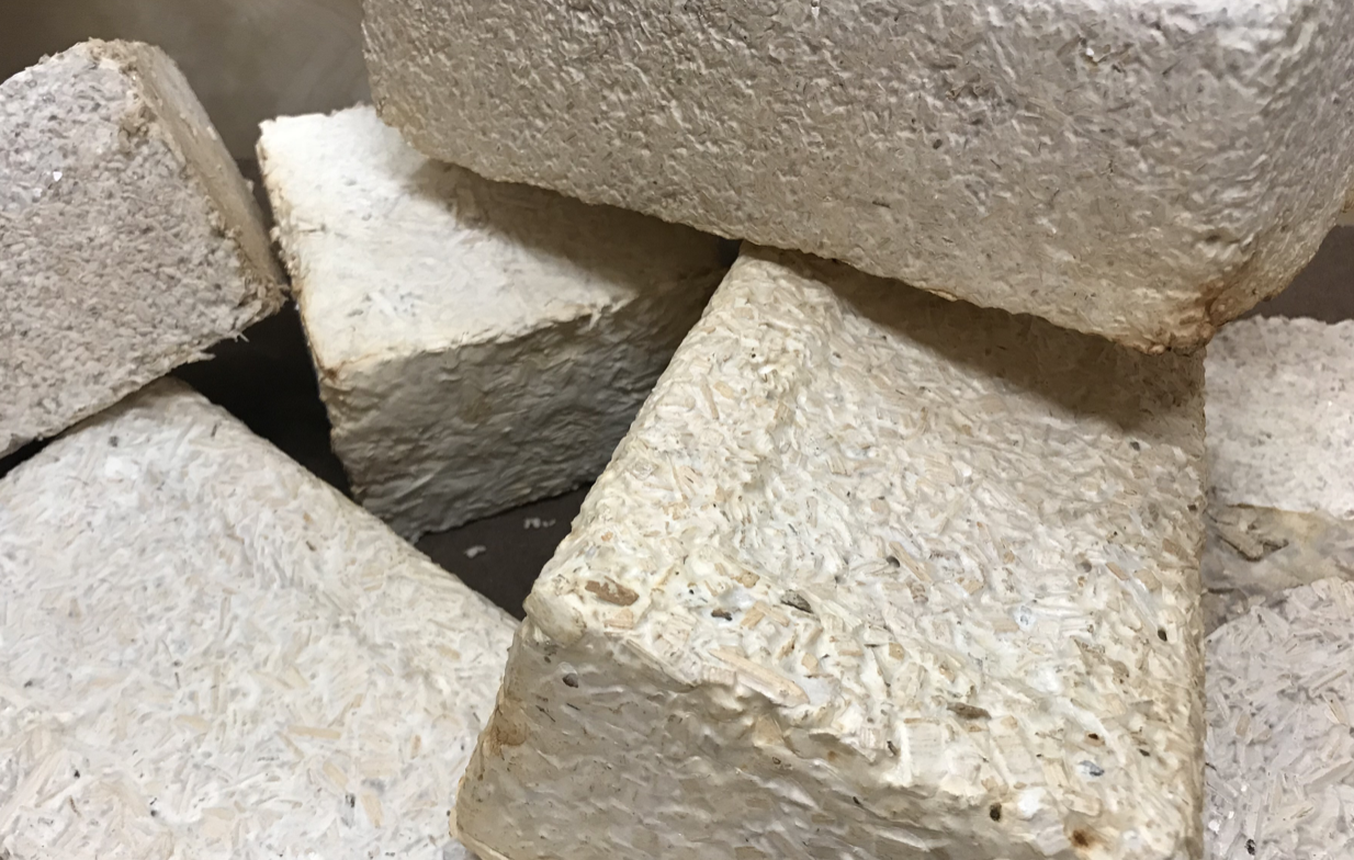 A pile of white bricks in a pile.
