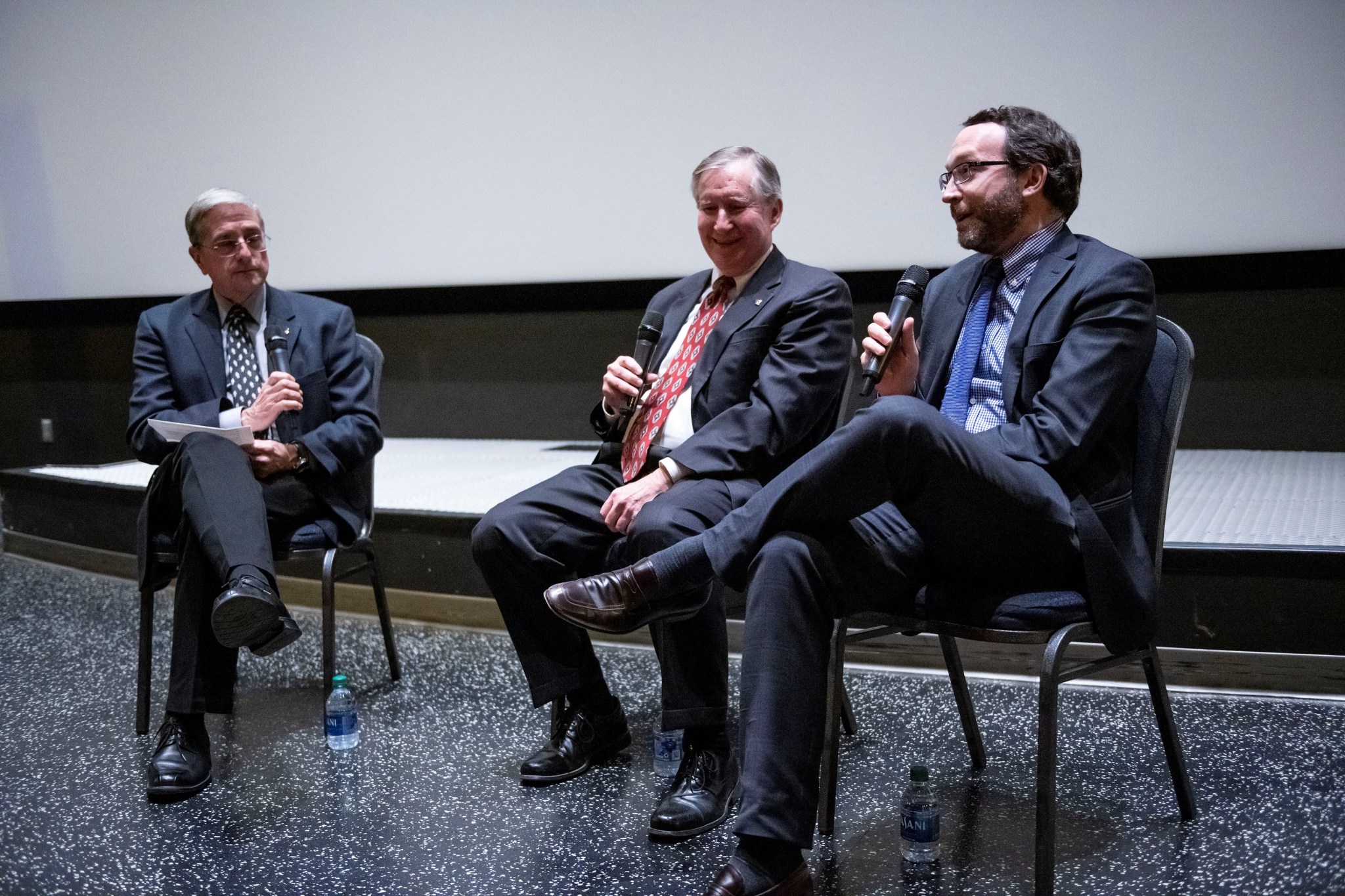 Former NASA astronaut Donald Thomas, left, moderates a Q&A with Raymond “Corky” Clinton, center, and Alexander MacDonald.