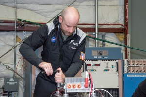 Engineers from NASA?s Armstrong Flight Research Center and Empirical Systems Aerospace prepare a cruise motor controller.