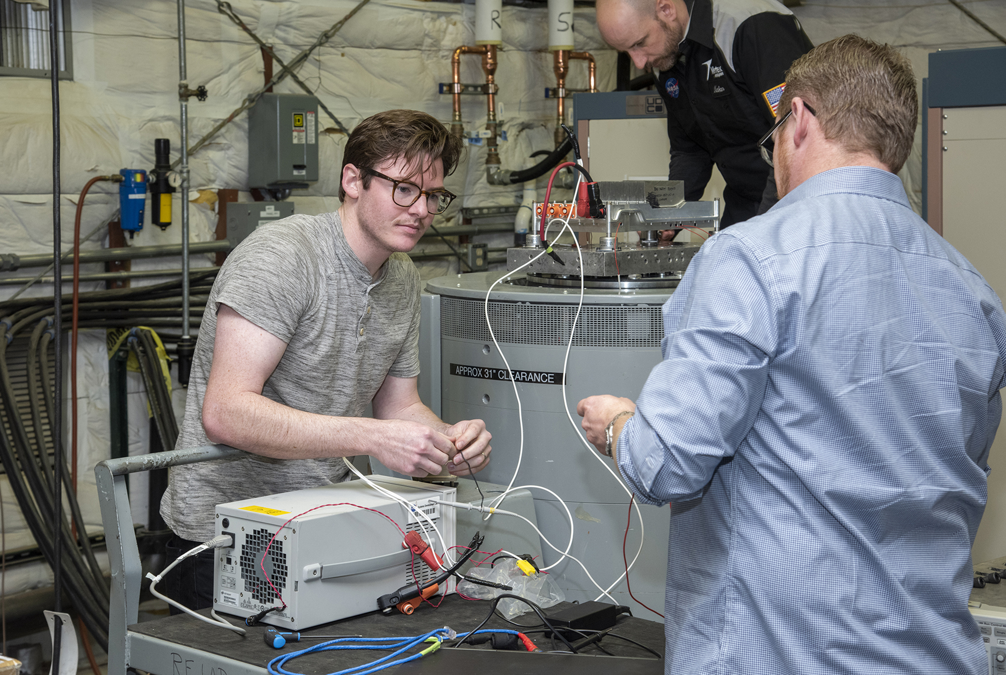 Engineers from NASA?s Armstrong Flight Research Center and Empirical Systems Aerospace prepare a cruise motor controller.