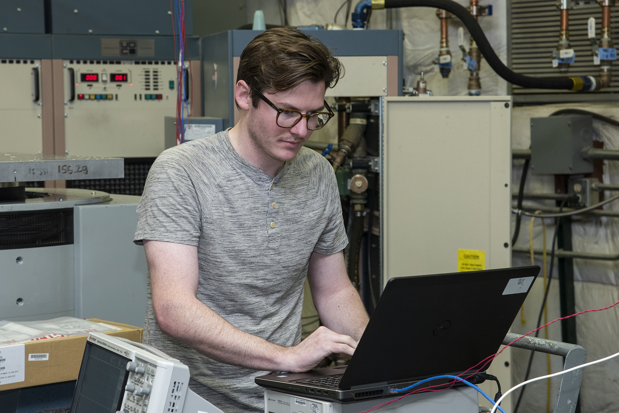 Engineers from NASA?s Armstrong Flight Research Center and Empirical Systems Aerospace prepare a cruise motor controller.
