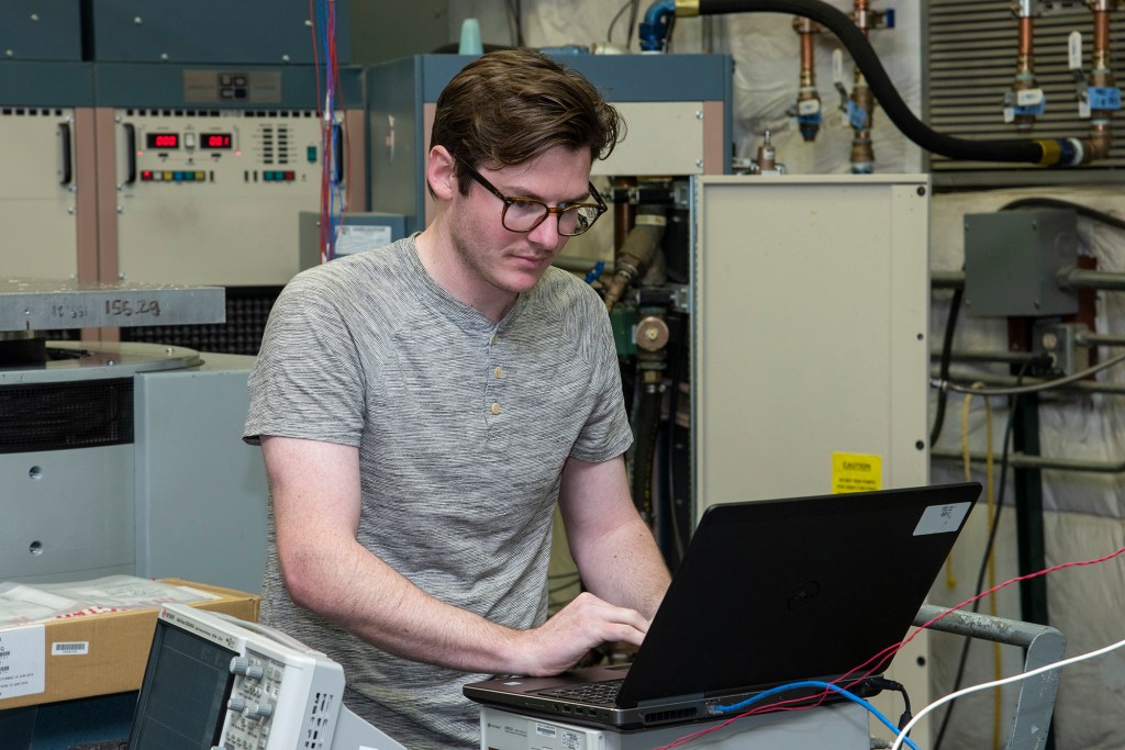 Engineers from NASA?s Armstrong Flight Research Center and Empirical Systems Aerospace prepare a cruise motor controller.