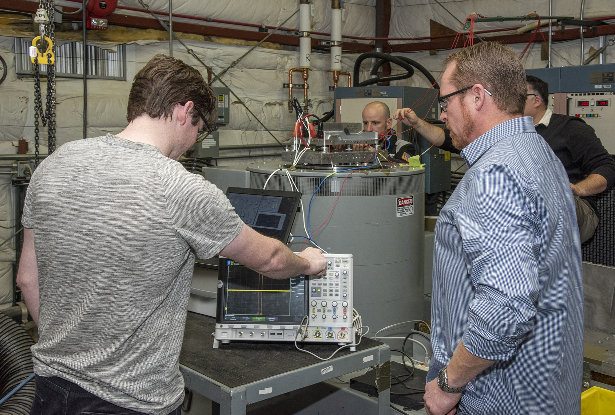 Engineers from NASA?s Armstrong Flight Research Center and Empirical Systems Aerospace prepare a cruise motor controller.