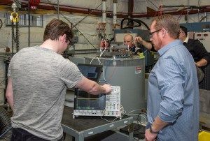 Engineers from NASA?s Armstrong Flight Research Center and Empirical Systems Aerospace prepare a cruise motor controller.