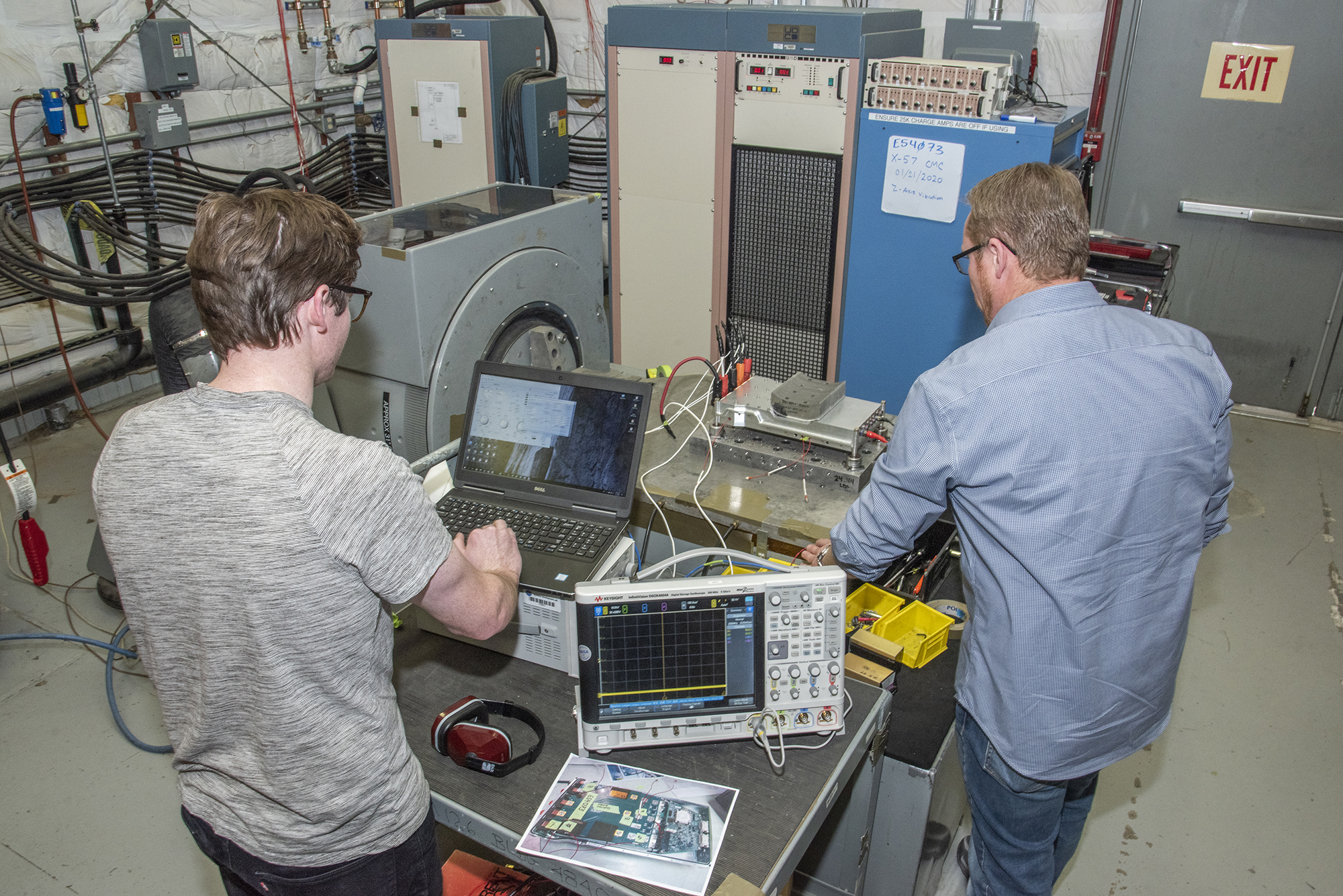 Engineers prepare a cruise motor controller, planned to be used on NASA?s all-electric X-57 Maxwell.