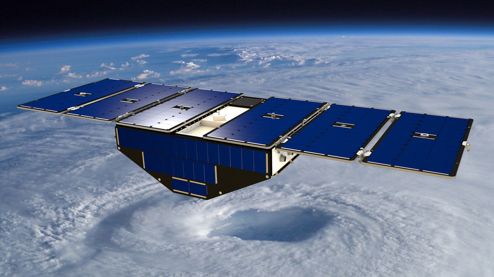Illustration of one of the CYGNSS spacecraft over an astronaut photo of a hurricane. The spacecraft is mostly blue, with one long solar panel that runs along its back and out both sides, like bird wings. Below the solar panel, a blue pentagon looks like an upside down house. 