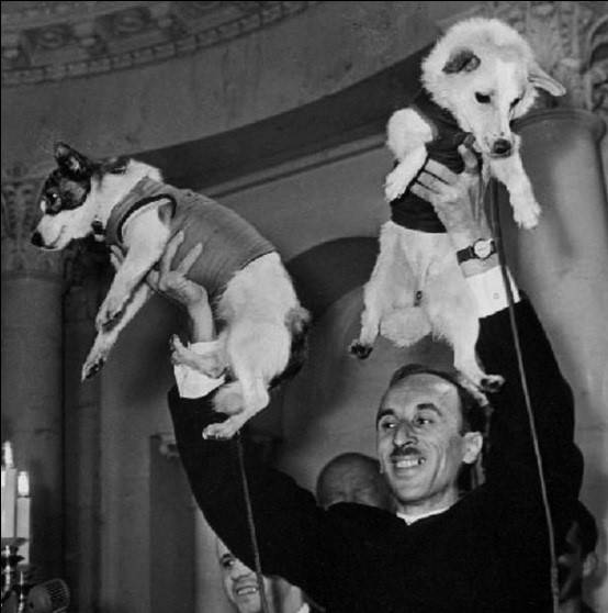 gazenko_holding_belka_and_strelka_after_flight