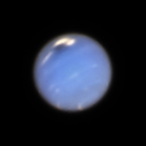 light-blue view of Neptune, seen by Hubble in 2018