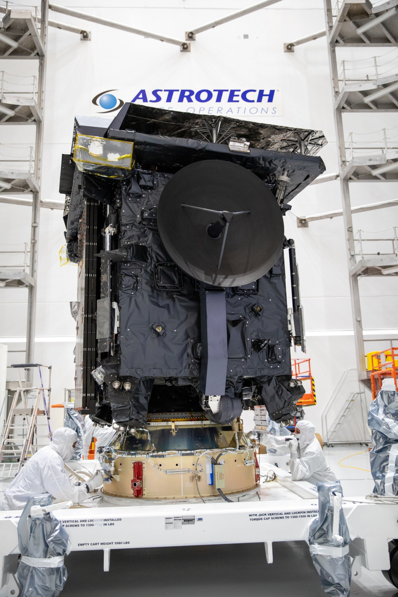 The Solar Orbiter spacecraft is prepared for encapsulation in the Atlas V payload fairing.