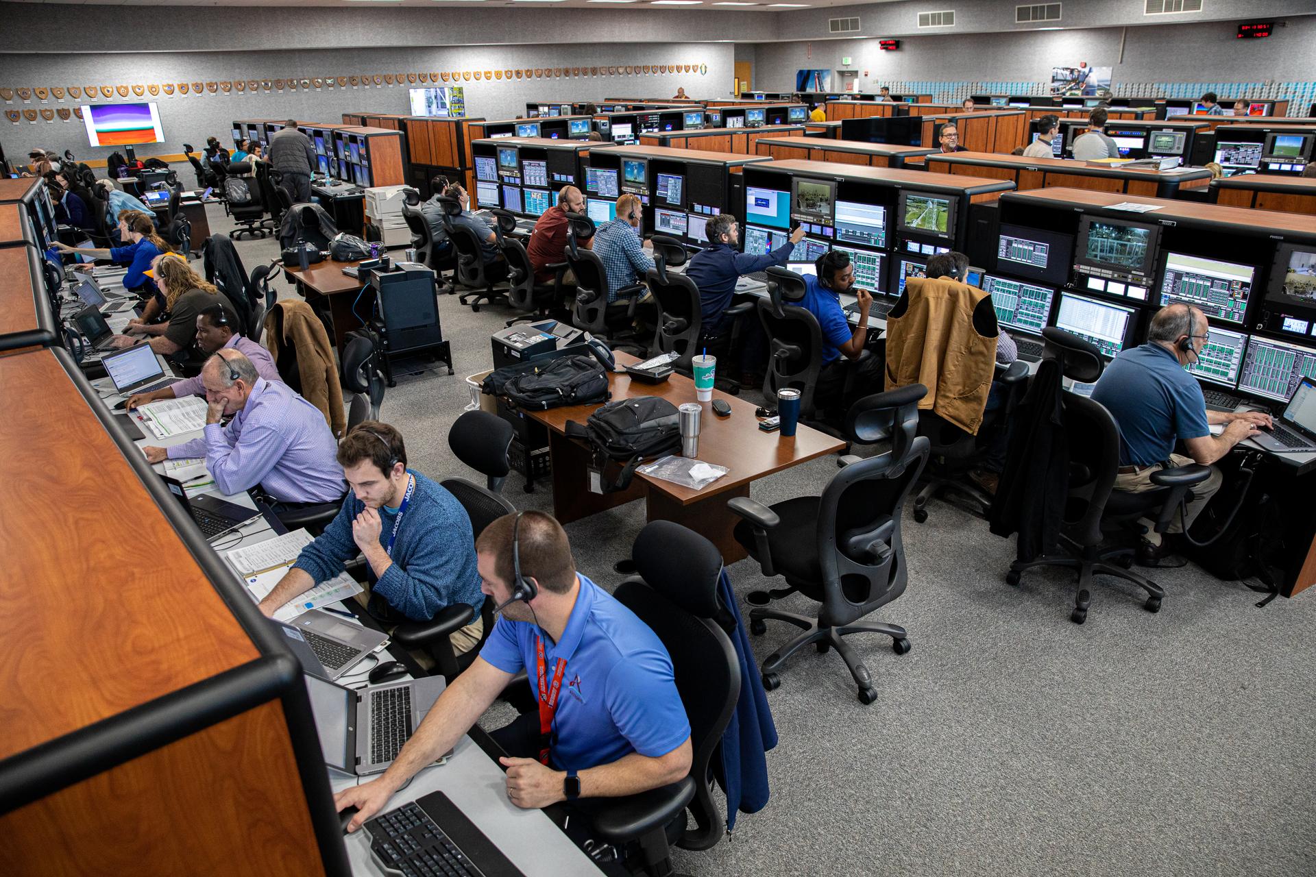 Artemis I launch team members at their consoles in Firing Room 1.