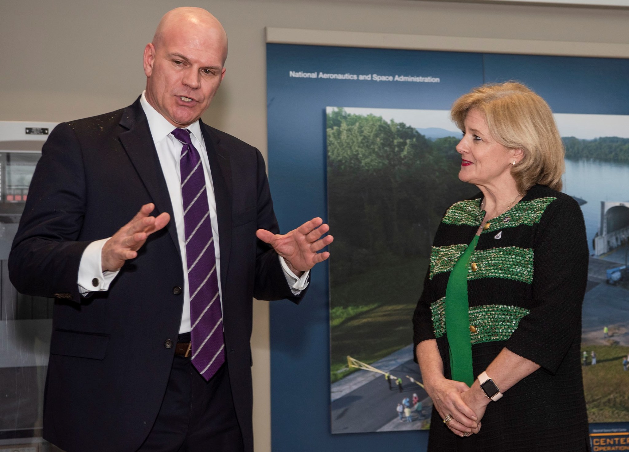 Richard L. Haley, left, of the FBI’s Information and Technology Branch, speaks with Jody Singer Feb. 18.