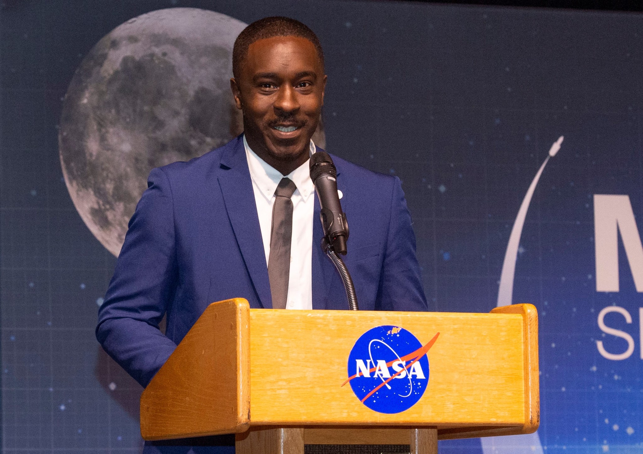 Nick Benjamin, a payload operation director in the Payload Operations Integration Center, emcees Marshall’s Black History Month.