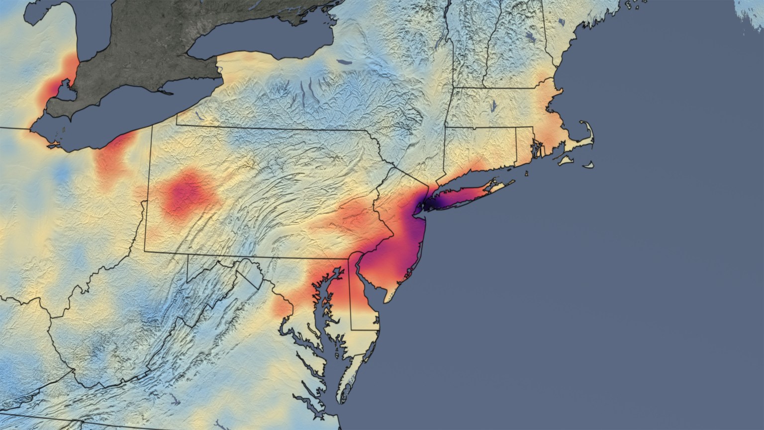 map showing air pollution, specifically tropospheric nitrogen dioxide (NO2), over the Northeast United States, the purple area indicates greatest density and is in New York City