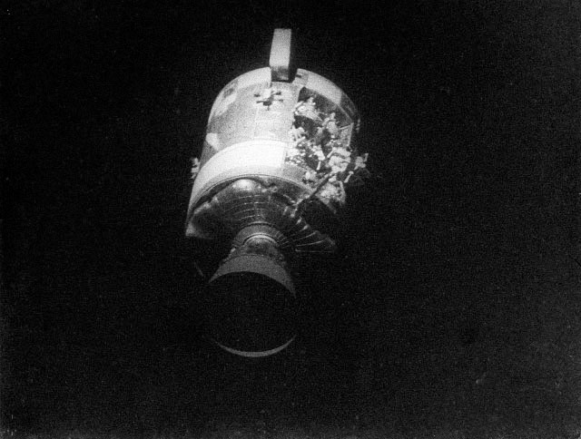 Apollo 13 service module showing damage was photographed by the crew members after it was jettisoned.