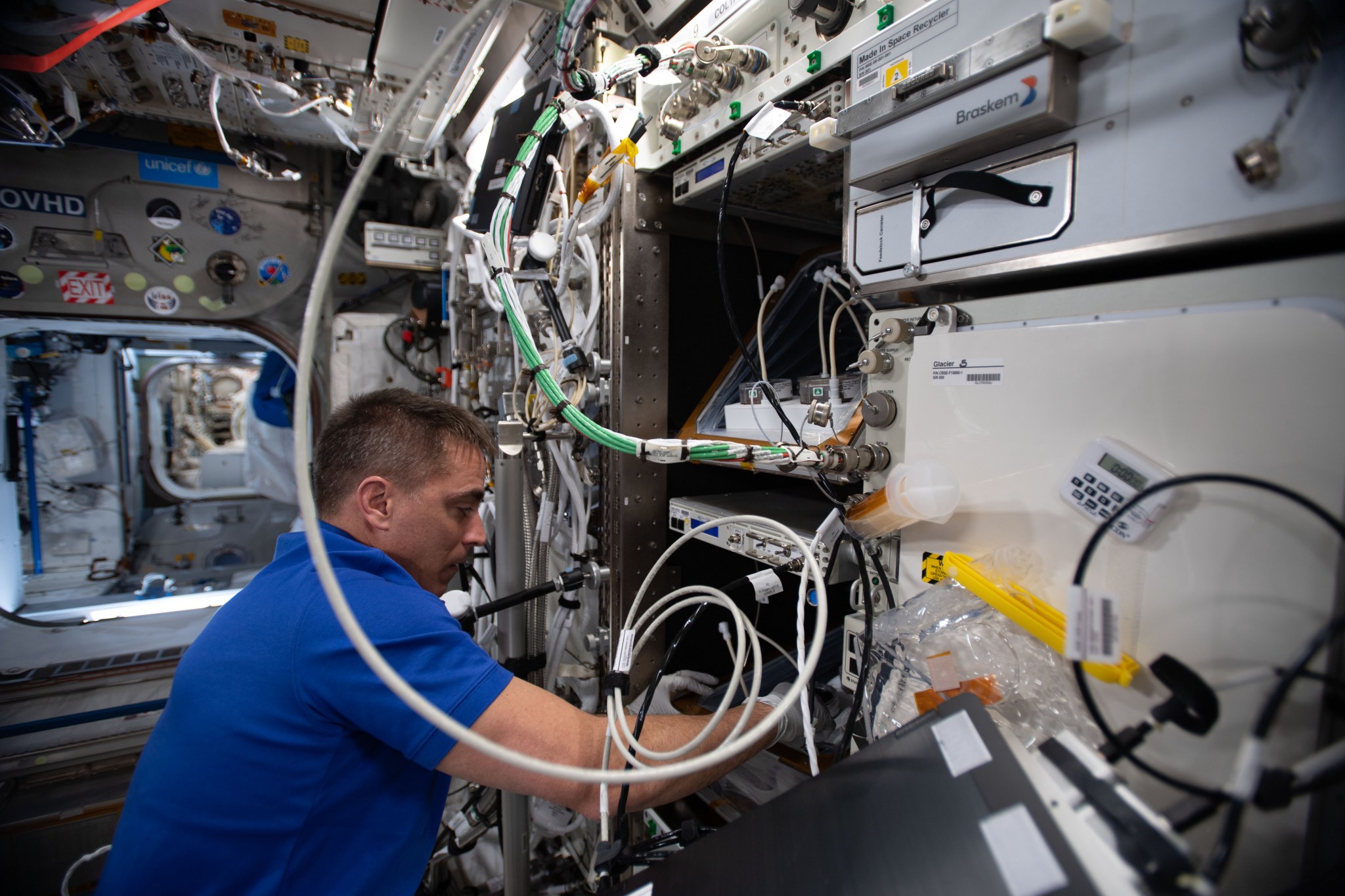 astronaut Chris Cassidy works on Veggie PONDS