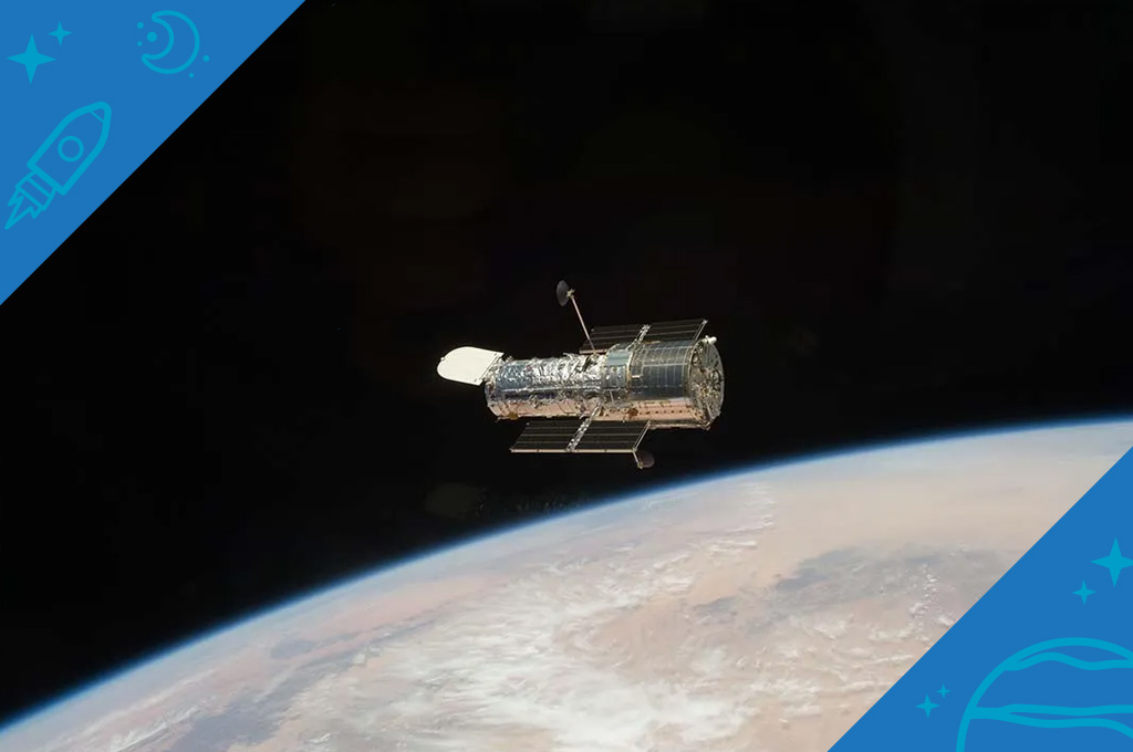 The large silver Hubble Space Telescope orbits above Earth