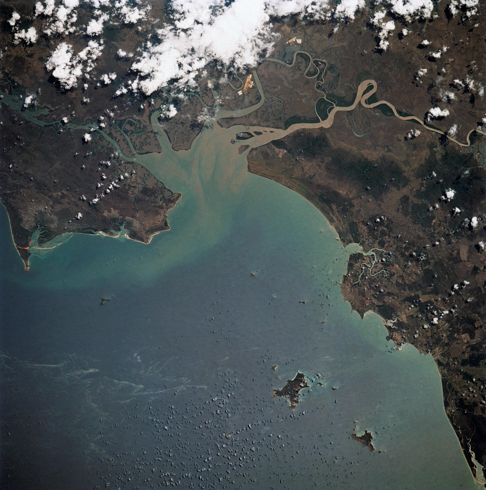 Aerial view of ocean and part of a shoreline.