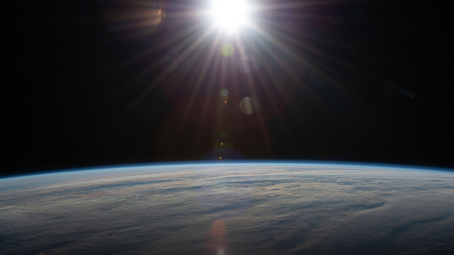 The sun's rays glisten above the Atlantic Ocean