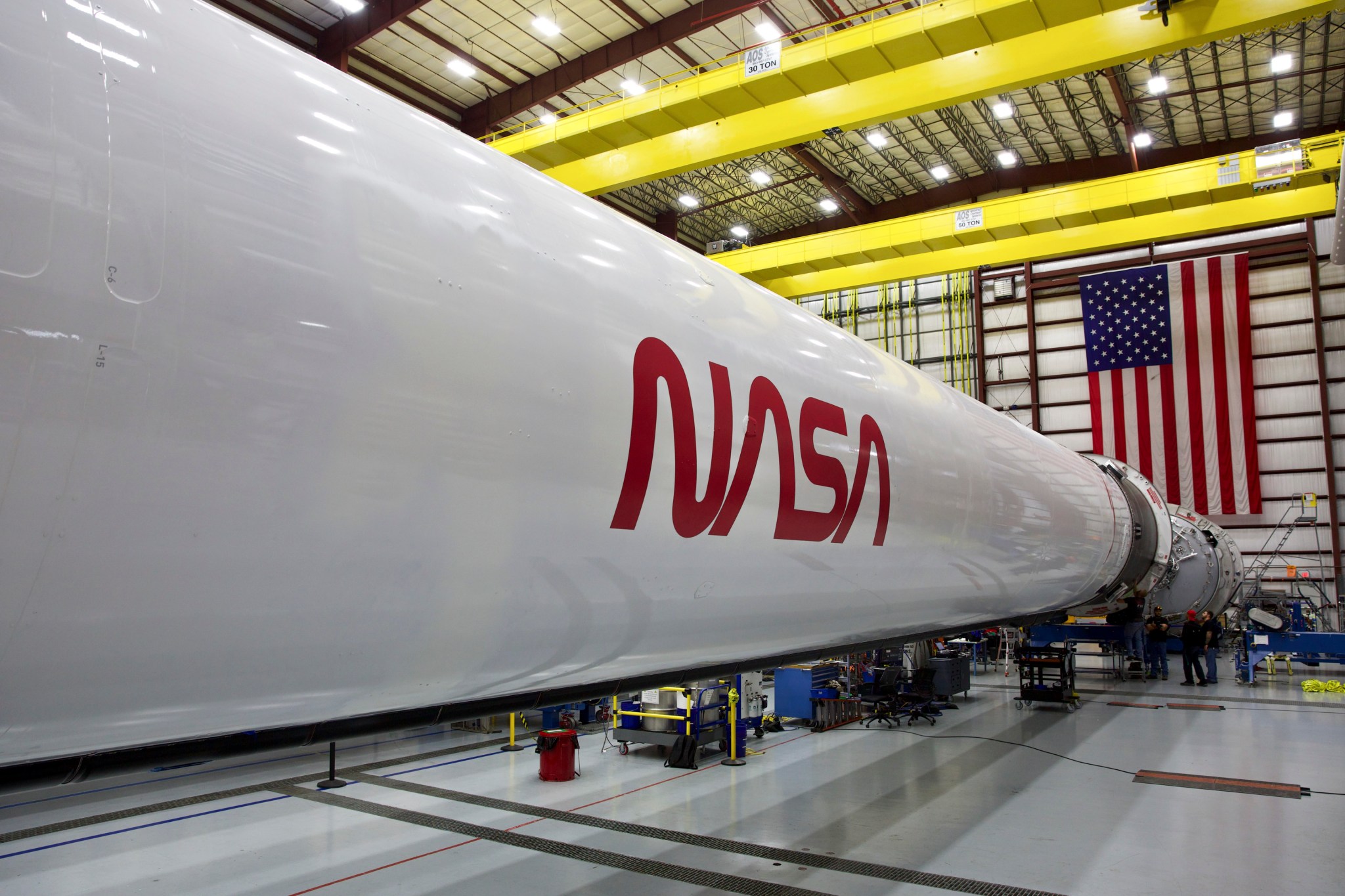 Falcon 9 rocket with NASA worm insignia