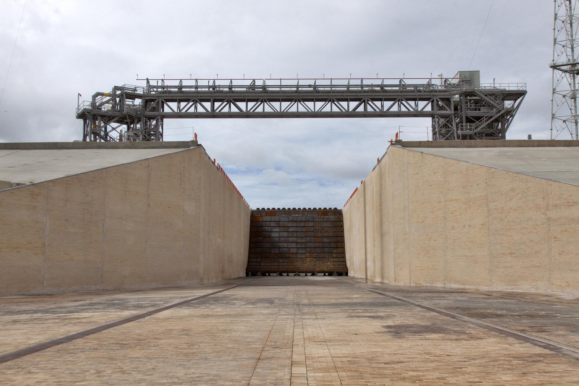 A view of the main flame deflector and flame trench at Launch Pad 39B at NASA's Kennedy Space Center in Florida.