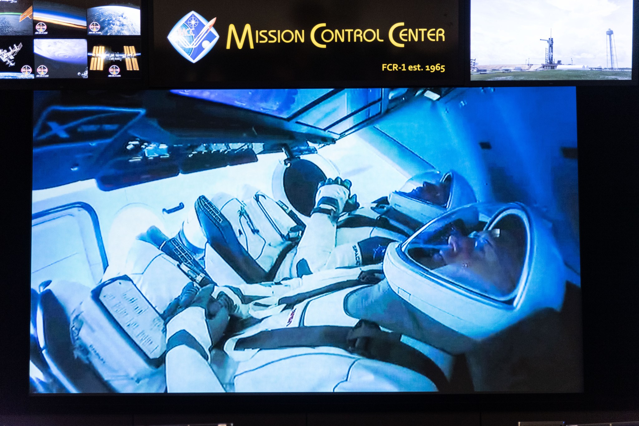 Coverage of Expedition 63 flight control team with Flight Director Zebulon Scoville during SpaceX DM-2 launch in Mission Control