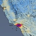 Data visualization of nitrogen dioxide concentrations over the southwest US. Most of the map is light blue fading to yellow, representing lower concentrations, with a mass of darker red to purple over LA, representing higher concentrations. The mass is smaller and lighter than in the previous image.