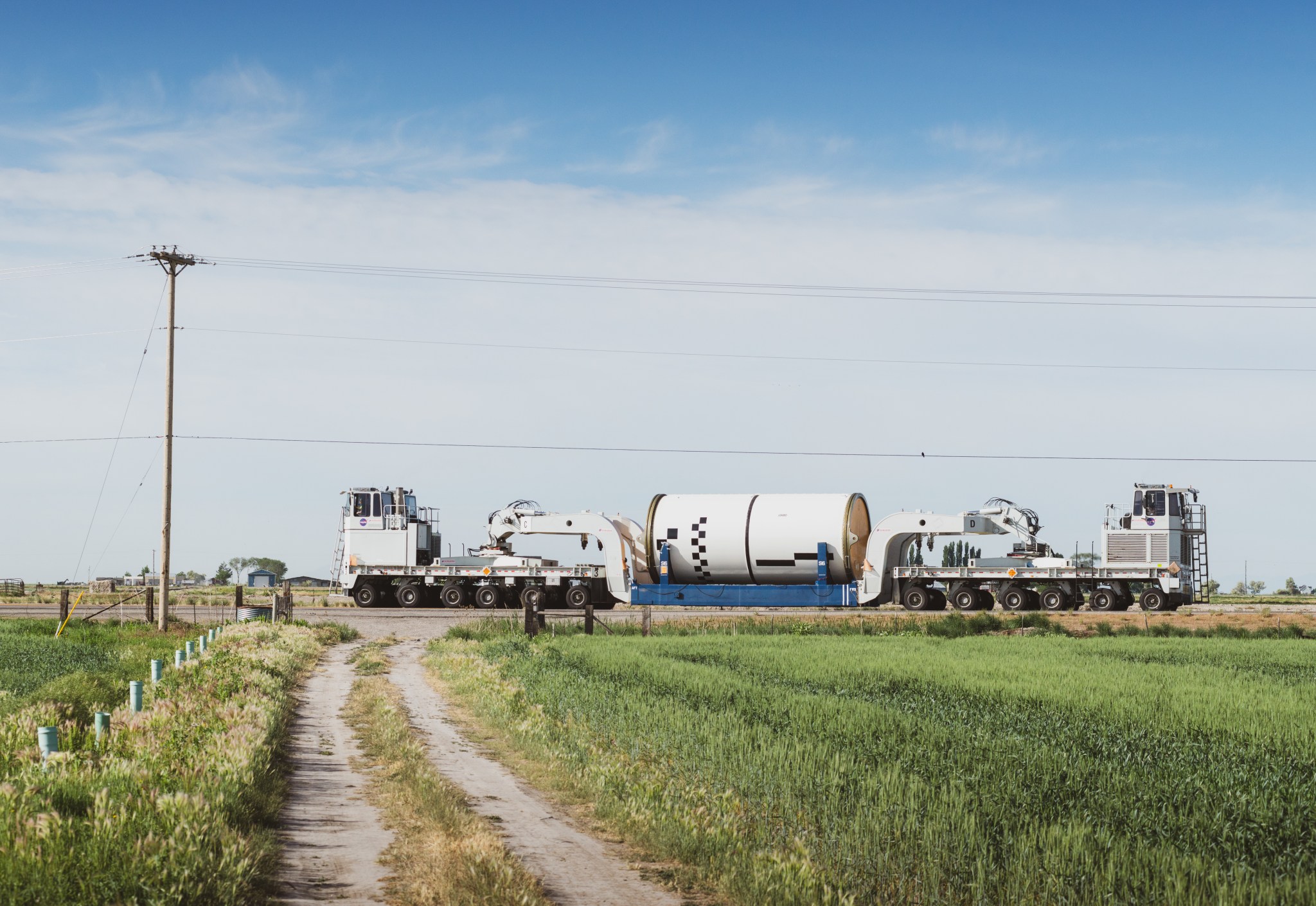 Specialized transporters move each of the 10 solid rocket motor segments for NASA’s Space Launch System rocket.