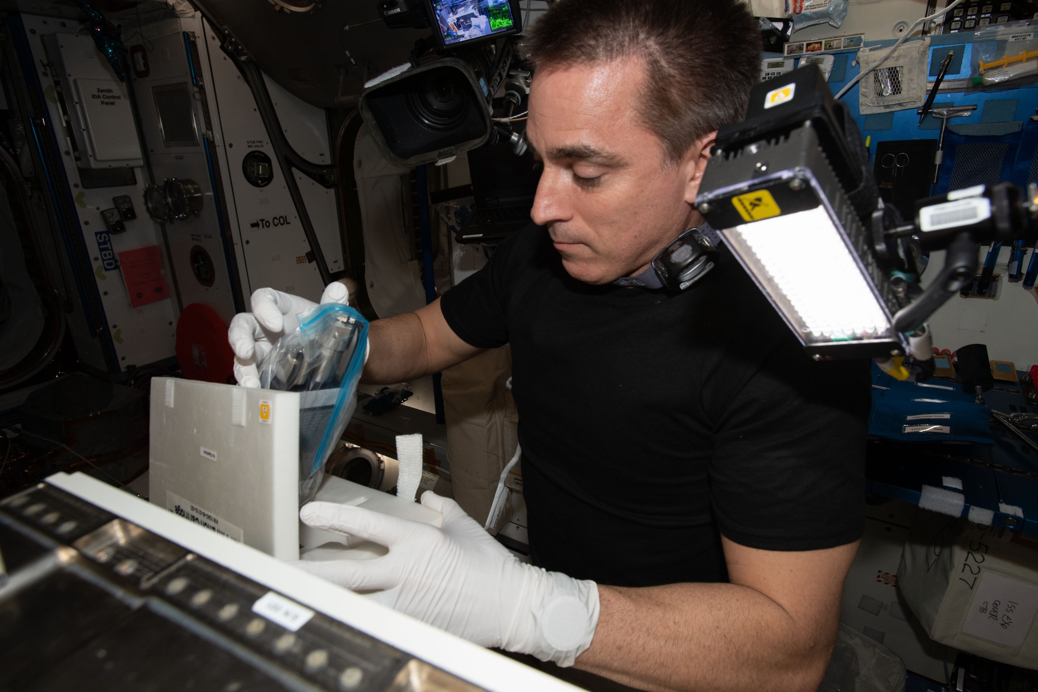 astronaut Chris Cassidy configuring Spectrum imager