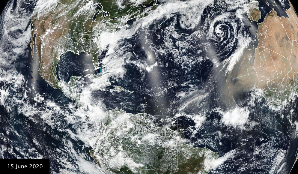 True color image of U.S. from satellite views, clouds can be seen over the land and ocean. 