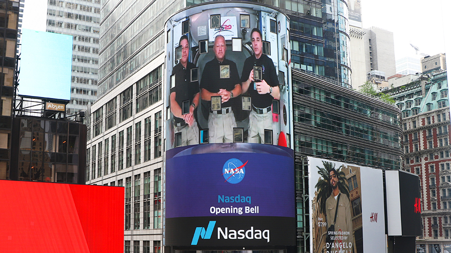 NASA astronauts pictured on the NASDAQ MarketSite in Times Square