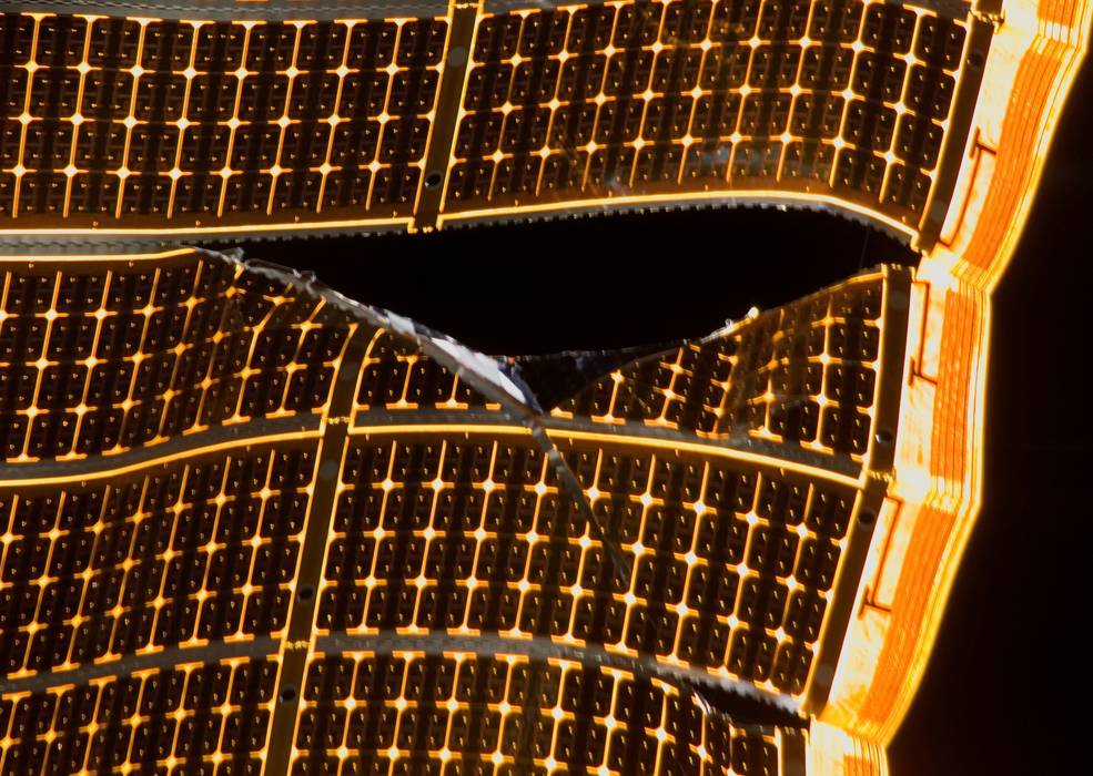 iss20_iss_evas_sts_120_close_up_of_solar_array_tear