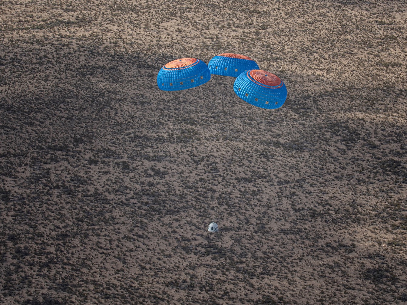 OSCAR parachuting down to surface.