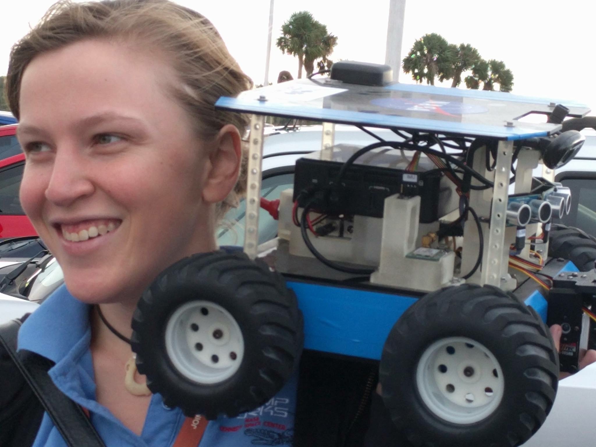 Raewyn Duvall, Iris deputy program manager, shown with a Swarmie during her first internship at Kennedy Space Center.